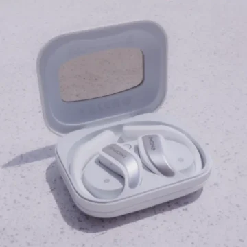 1more s7 earbuds in an open case on a white table