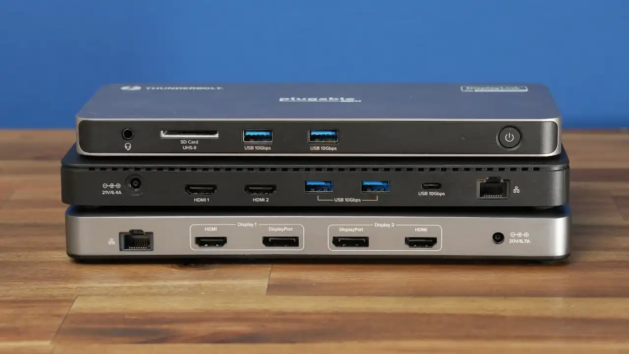3 plugable docking stations on top of each other on a table
